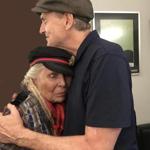 Longtime friends Joni Mitchell and James Taylor shared a hug backstage at the Hollywood Bowl in Los Angeles.